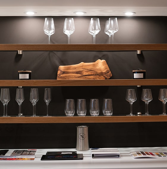 Oak Edged and Lit Glass Shelving Area