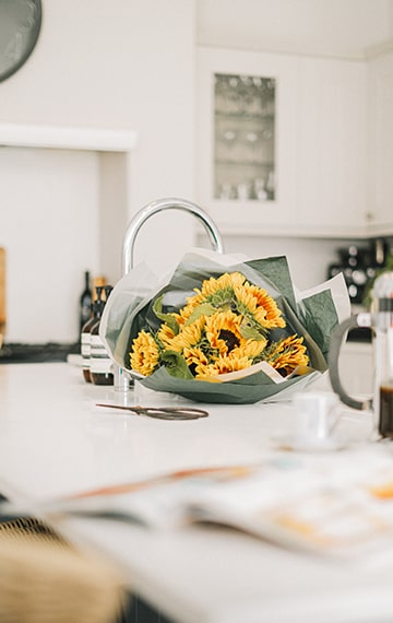 Bouquet of Sunflowers on Kitchen Table