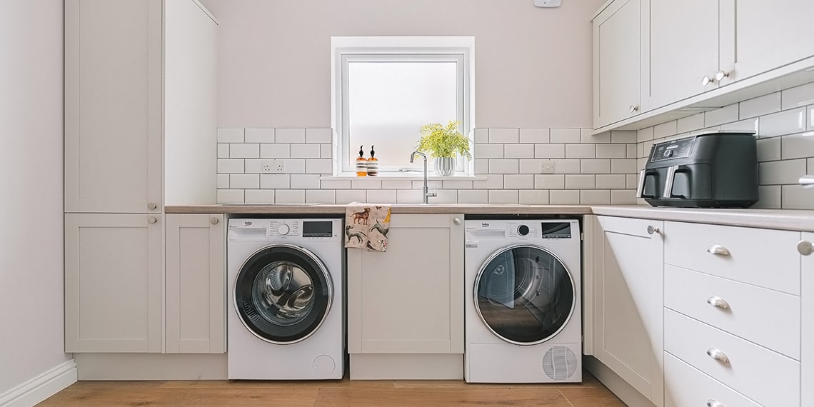 Generous utility room with plentiful storage
