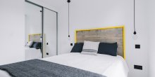 Contemporary White, Grey and Yellow Bedroom