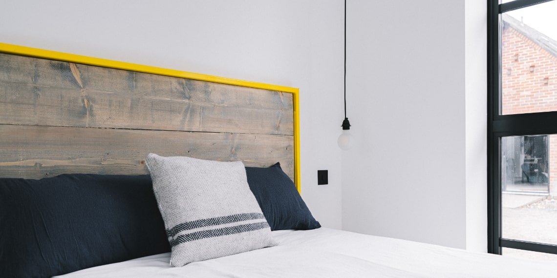 Bed with a Metal Yellow Frame