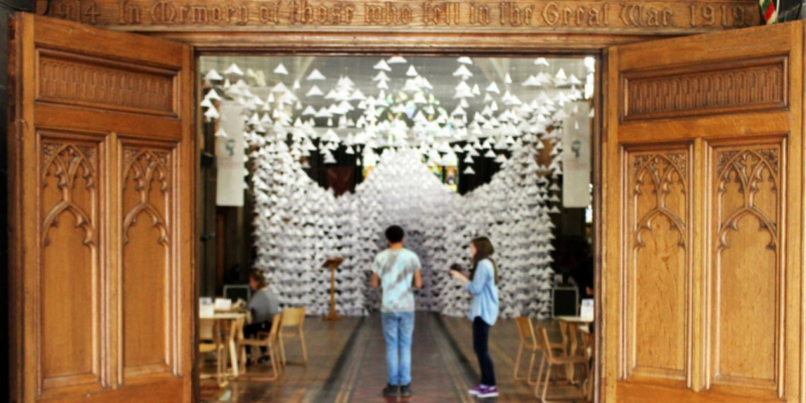 Hat Installation, Stockport Manchester output. 10,000 paper hats suspended from St Marys Church