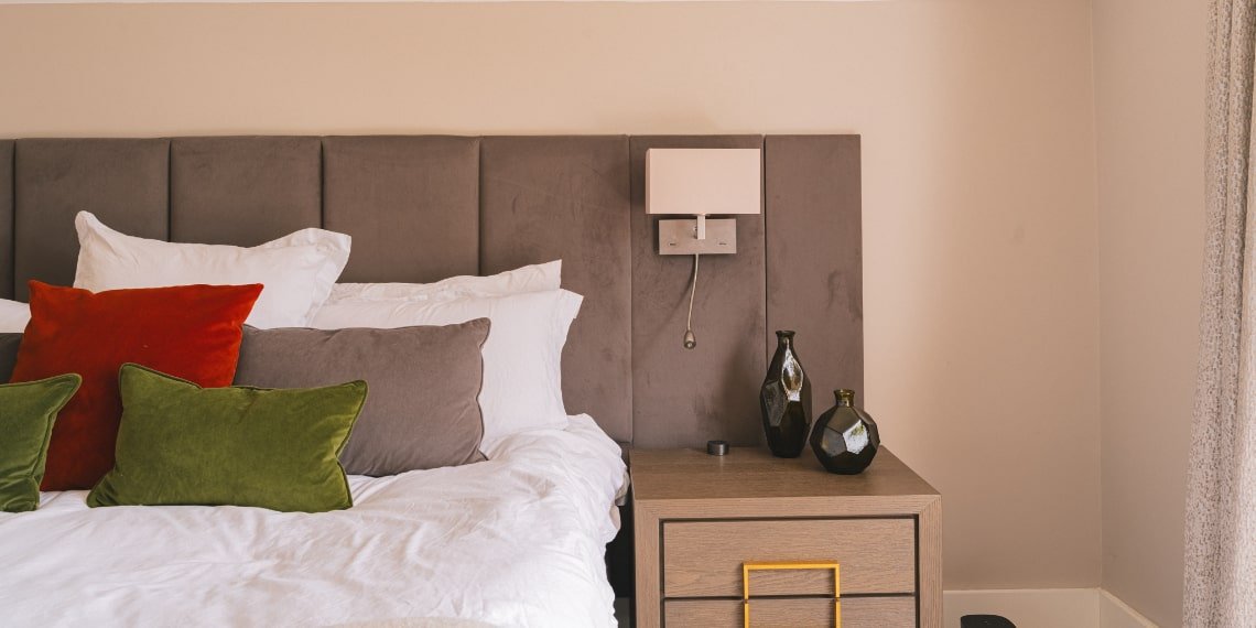 Bedside Table with Decorative Green Vases