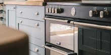 Shaker kitchen with range style cooker